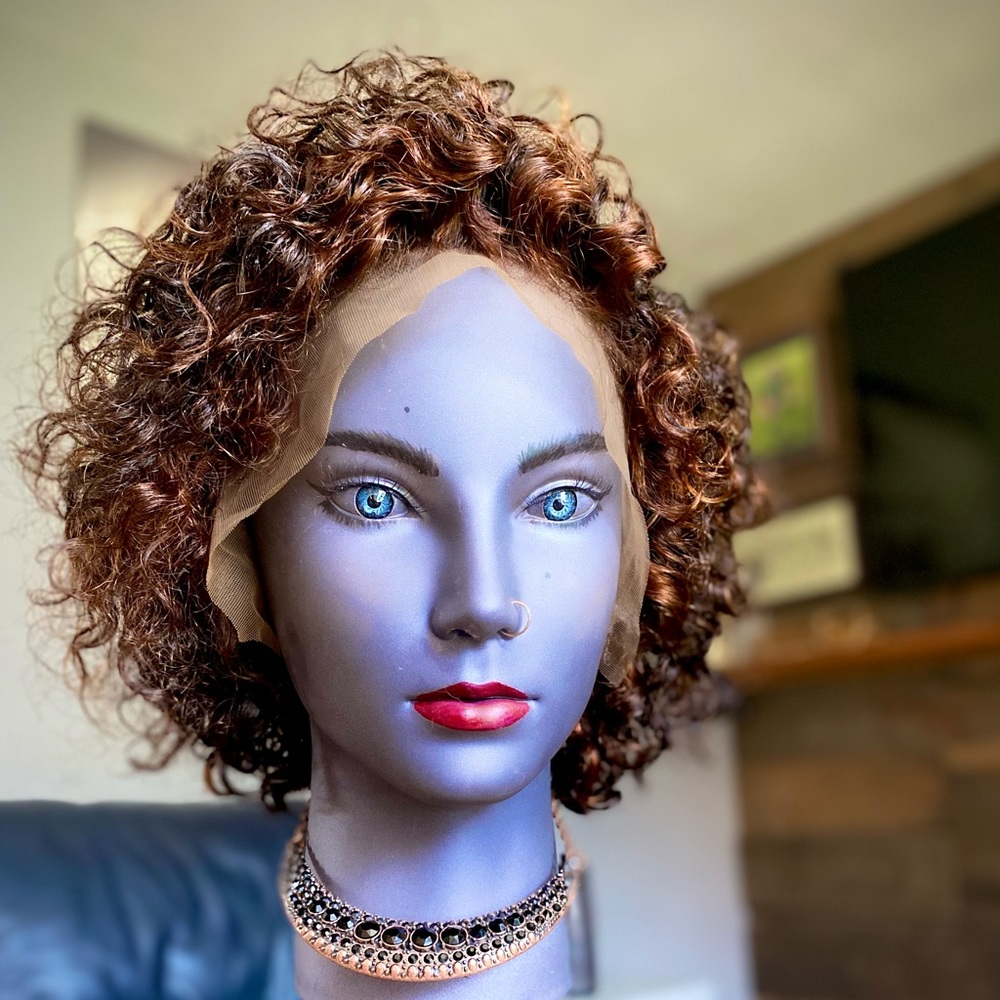 SOLD.     Curly human hair 13x6